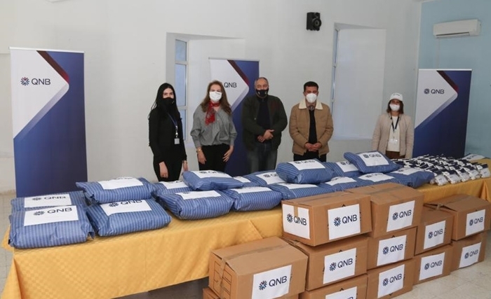  يرافق أطفال تالة من أجل شتاء دافئ QNB